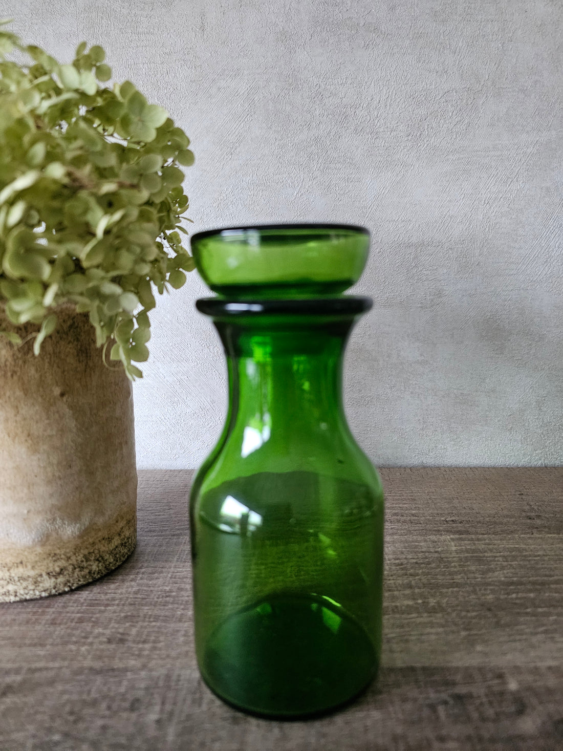 Groene glazen apothekerspot
