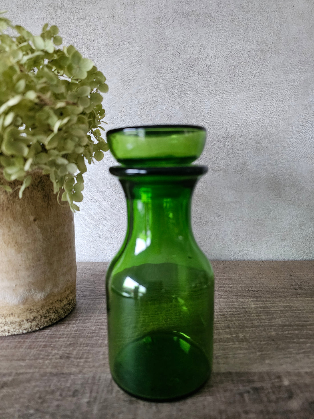 Groene glazen apothekerspot