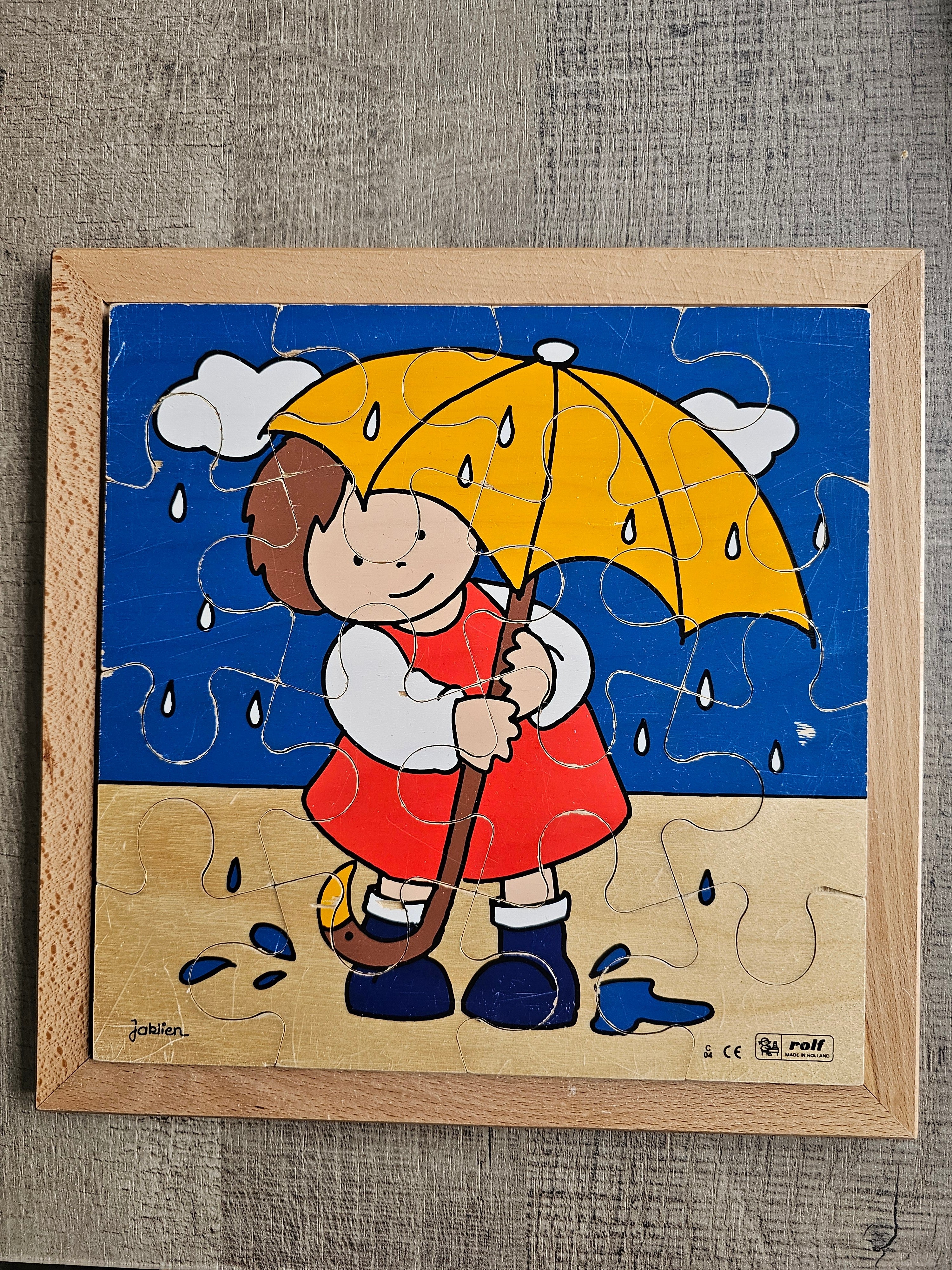 Rolf houten puzzel meisje paraplu