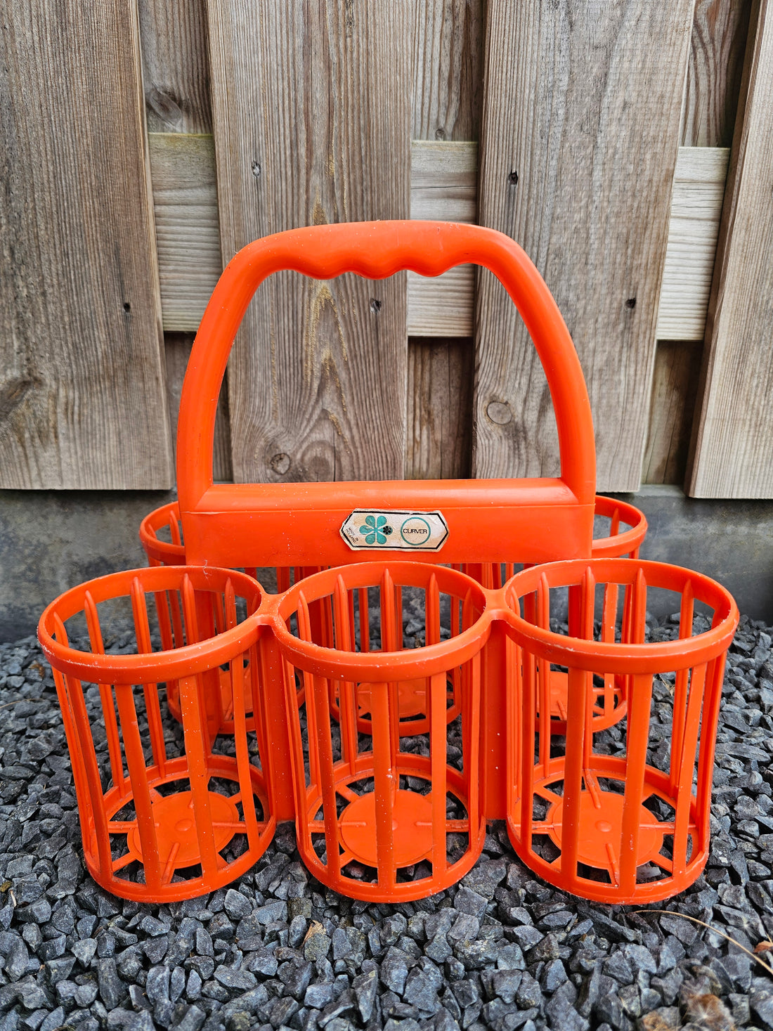 Oranje Curver flessenmand