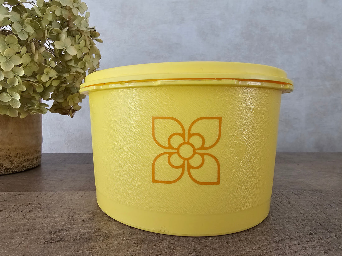 Tupperware gele trommel met bloem