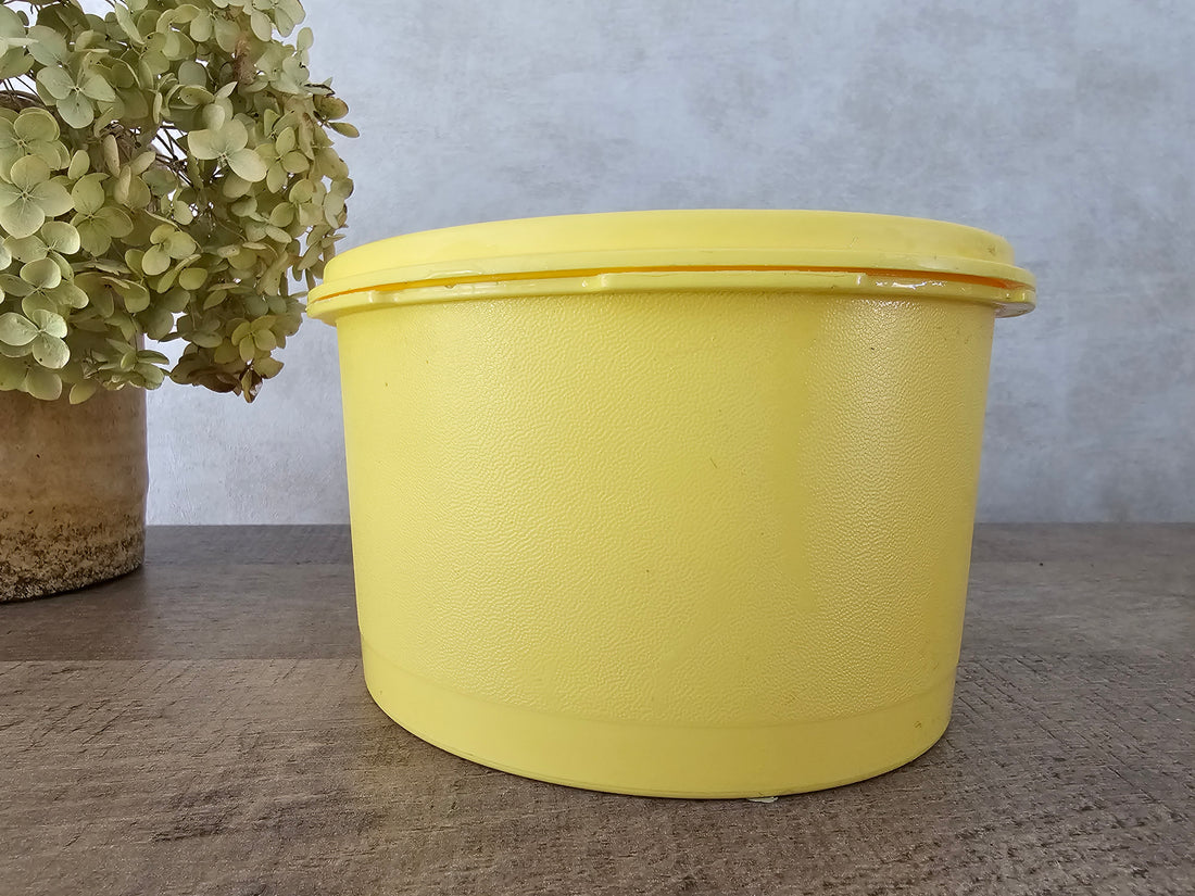 Tupperware gele trommel met bloem