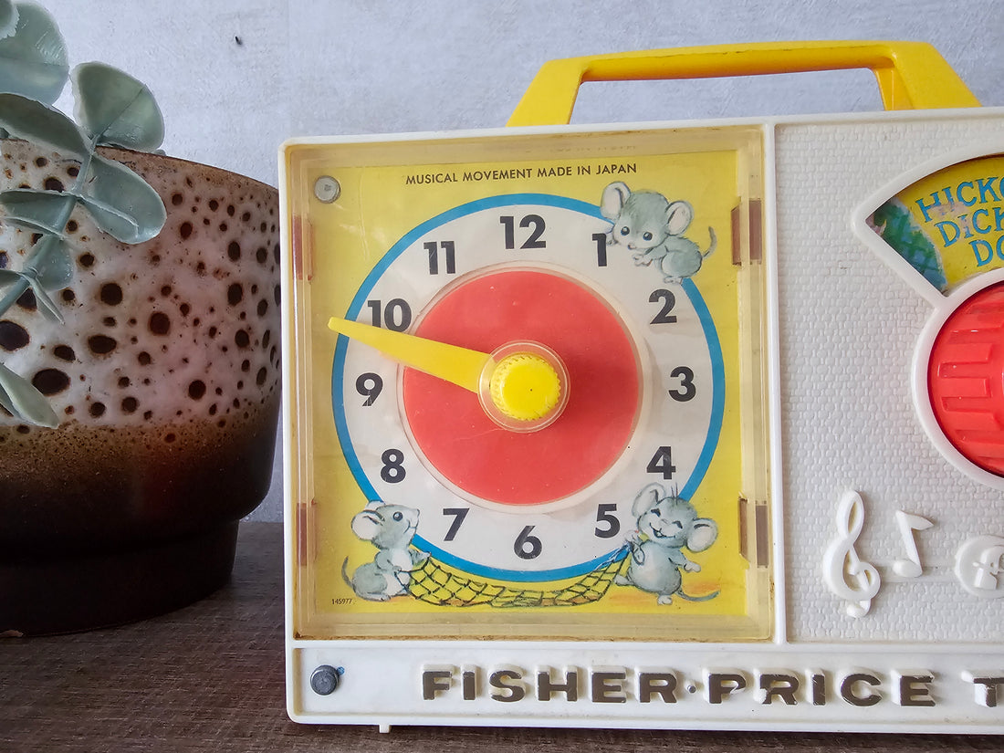 Fisher price vintage muziekdoosje met klok