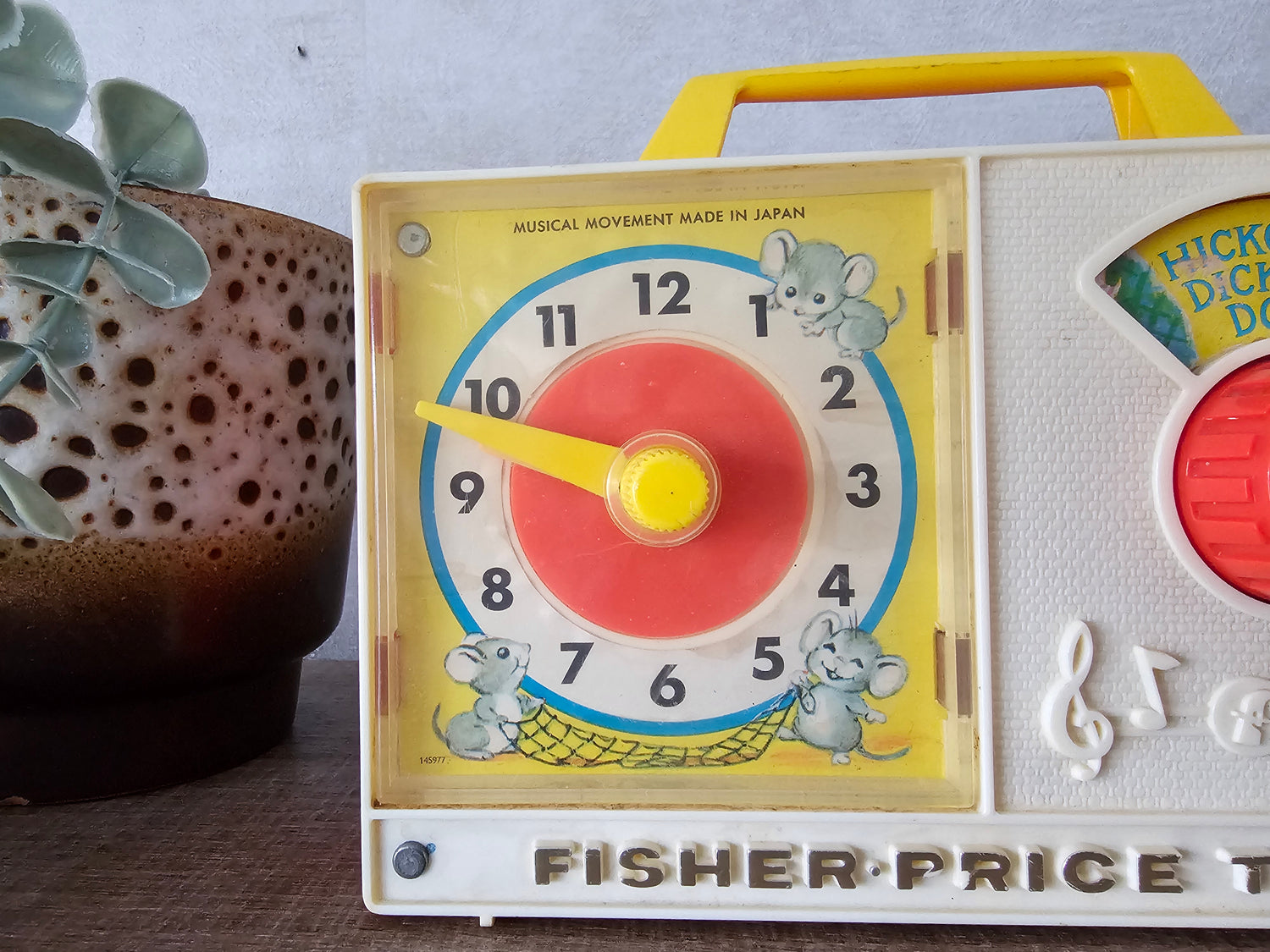 Fisher price vintage muziekdoosje met klok