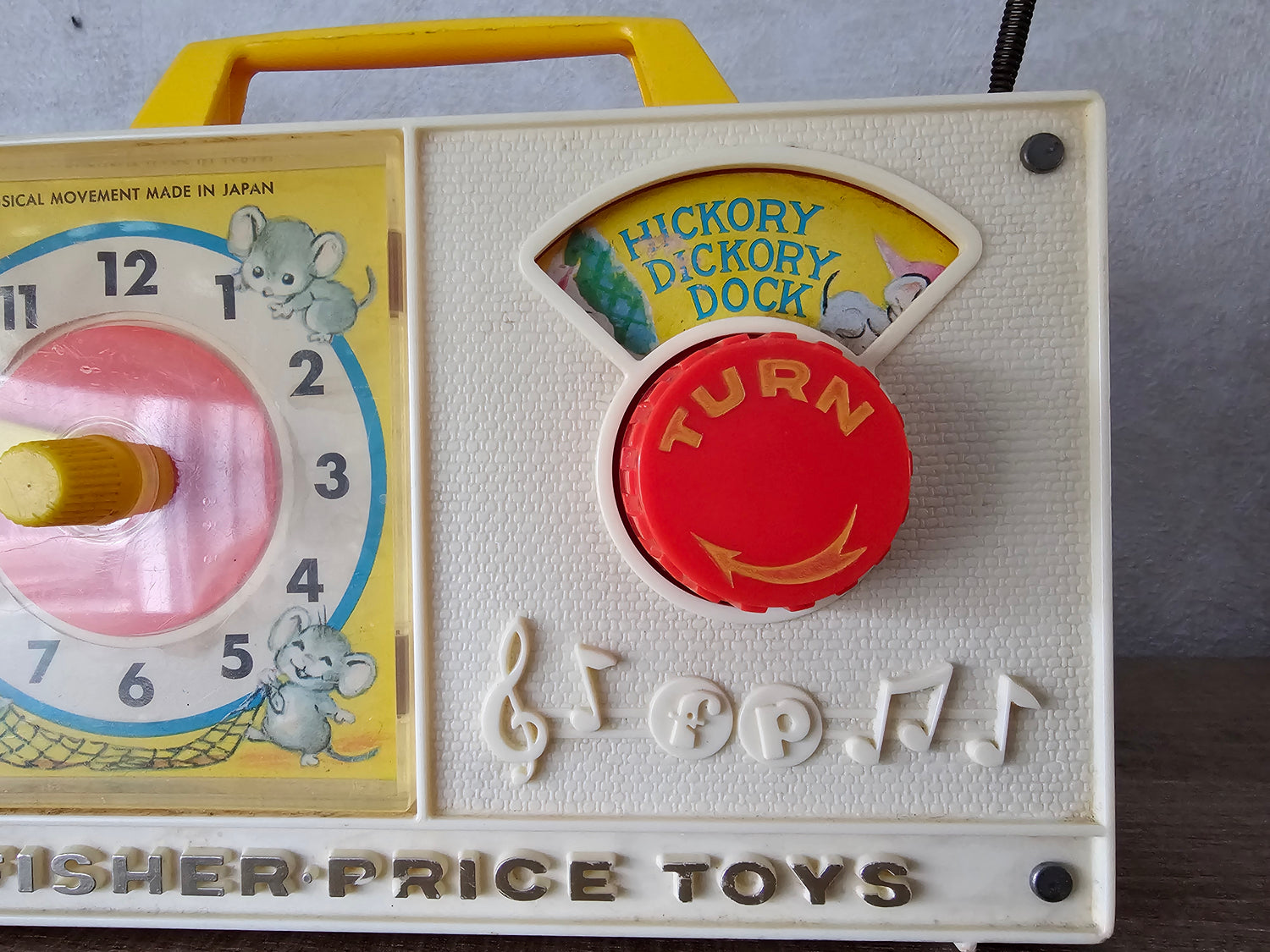 Fisher price vintage muziekdoosje met klok