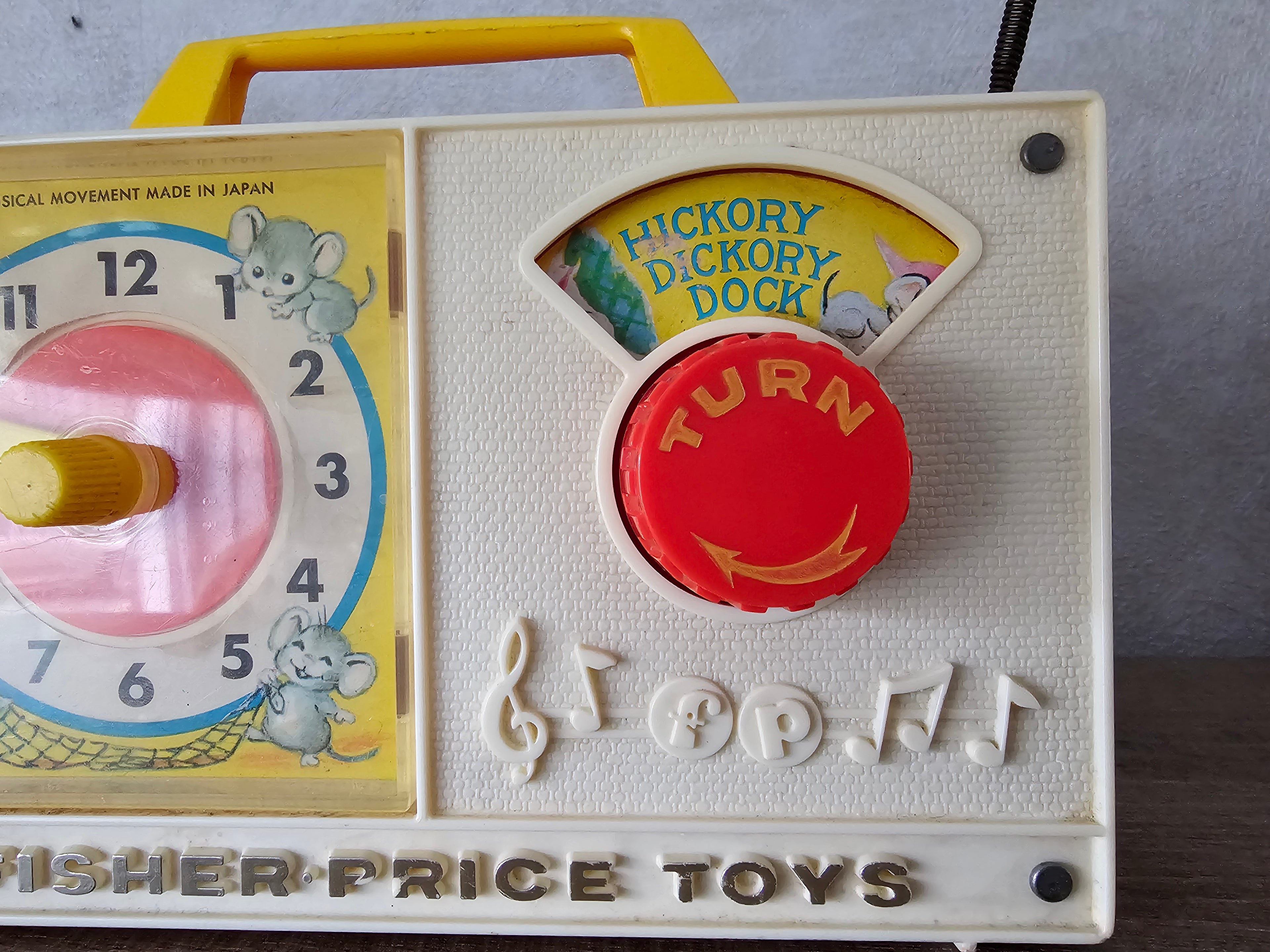 Fisher price vintage muziekdoosje met klok