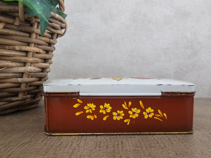 Vintage blik bruin met bloemen