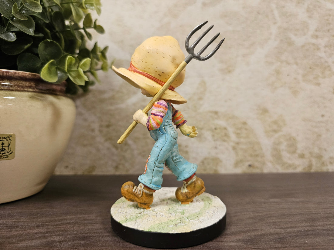 Sarah Kay meisje met hooivork