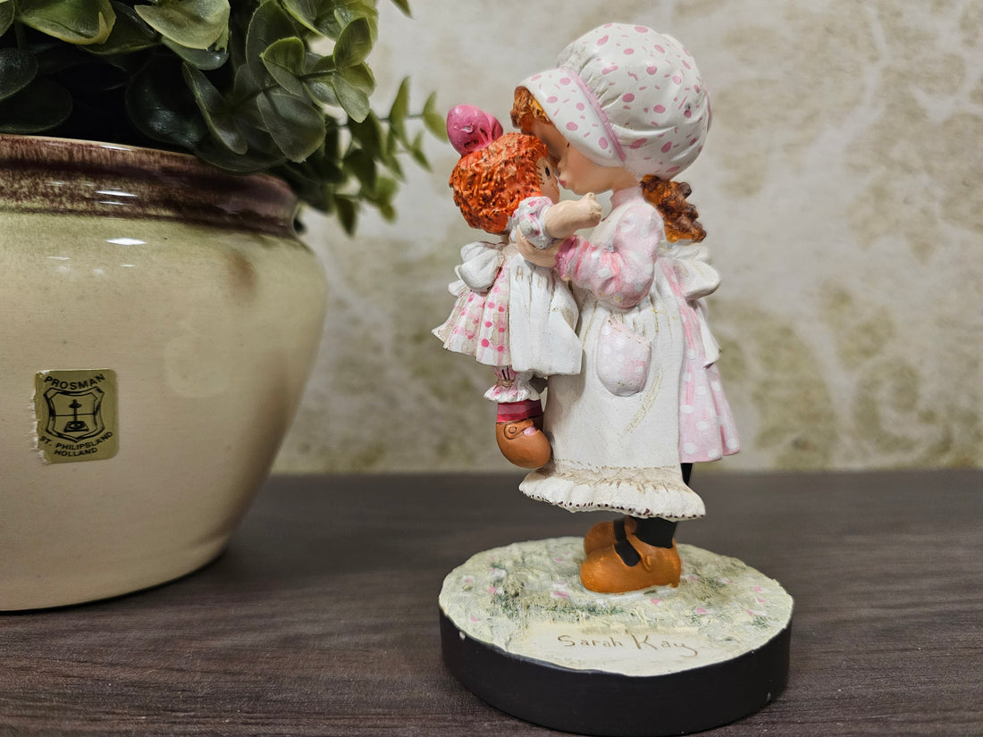 Sarah Kay meisje met pop