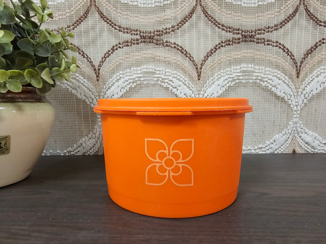 Tupperware oranje trommel sterdeksel