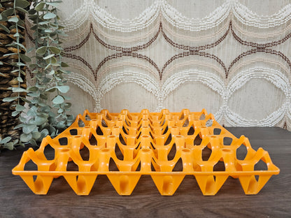 Oranje vintage kunststof eierrek