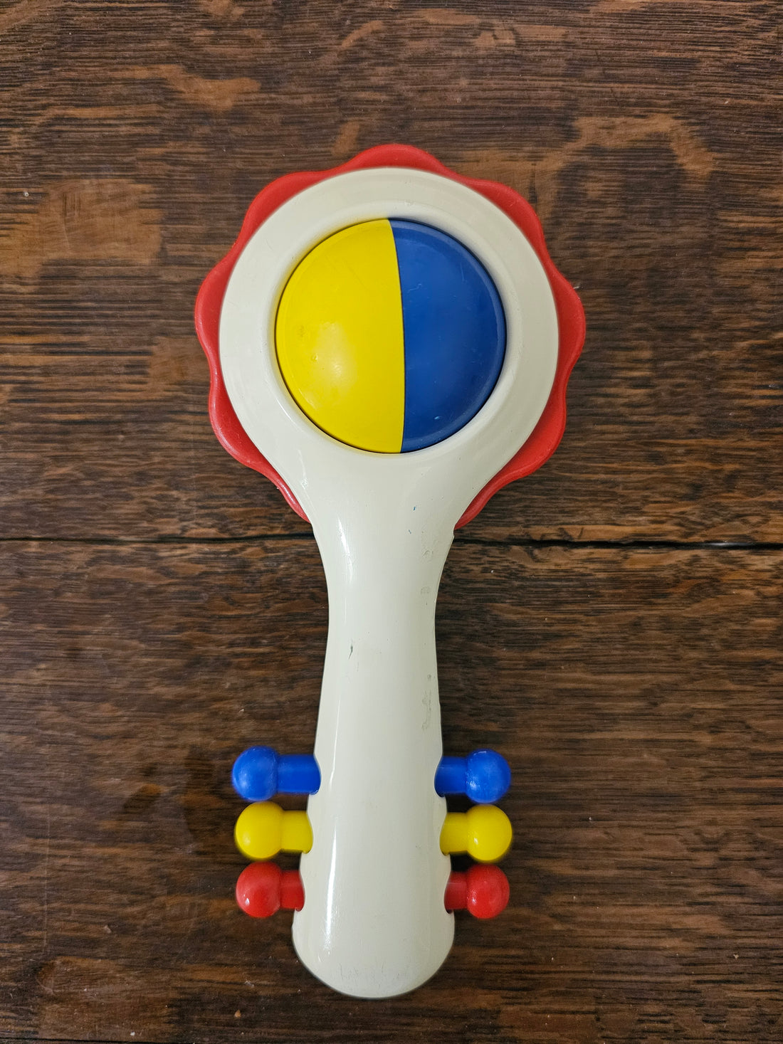 Ambi Toys rammelaar handy dandy rode rand