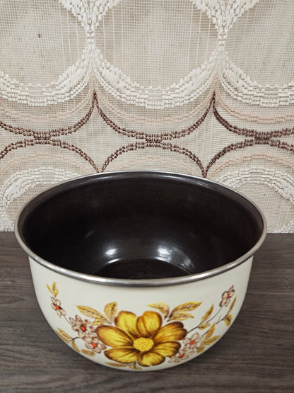Emaille kom met gele bloemen