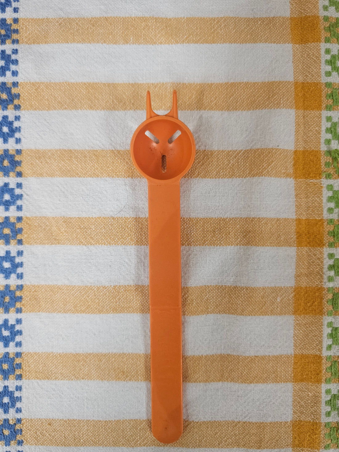 Tupperware oranje zuurkatje lepel