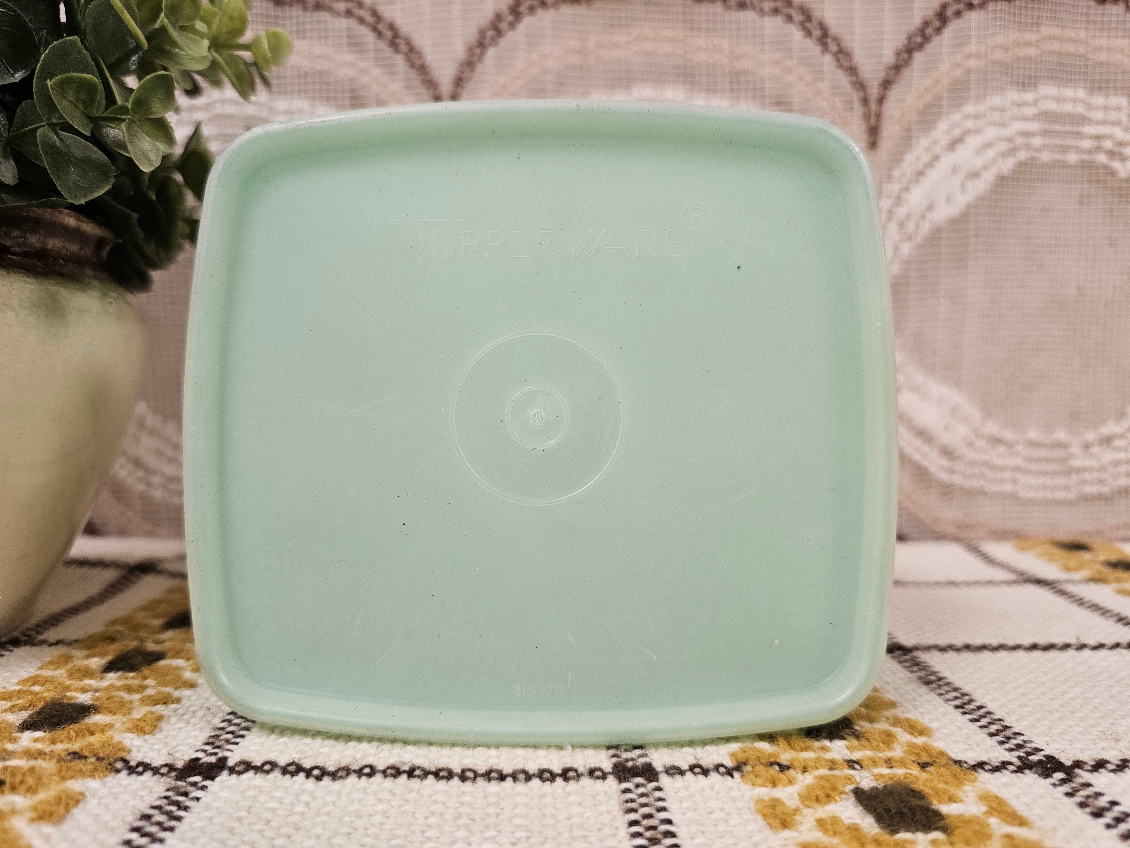 Tupperware bakje pastelgroen met deksel