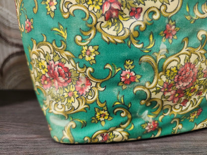 Vintage theebeurs met knip groen bloemenpatroon