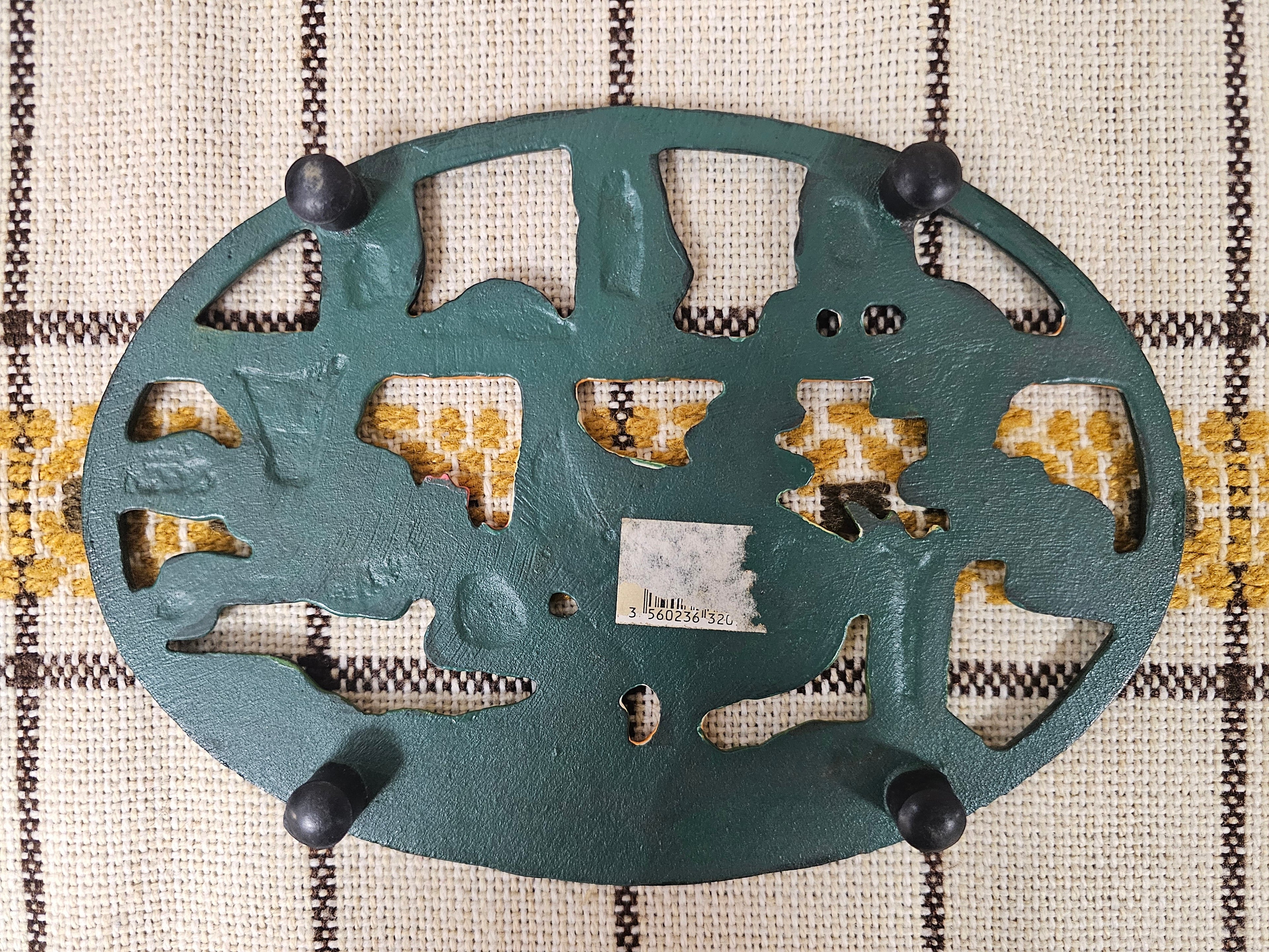 Gietijzeren onderzetter eend