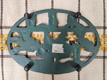 Gietijzeren onderzetter eend