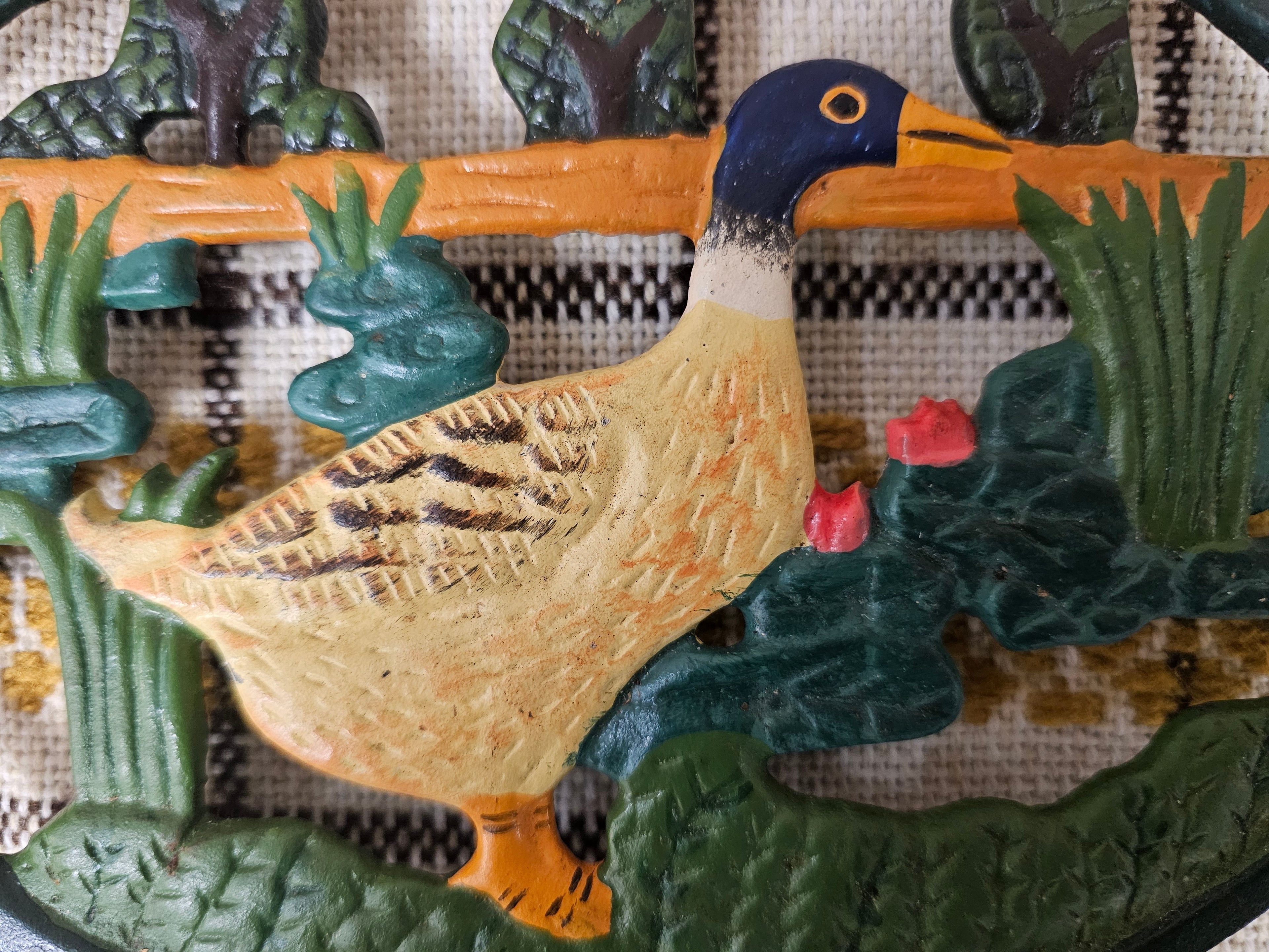 Gietijzeren onderzetter eend