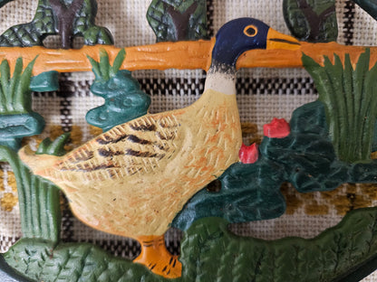 Gietijzeren onderzetter eend