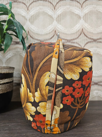 Vintage theebeurs met knip bruine bladeren