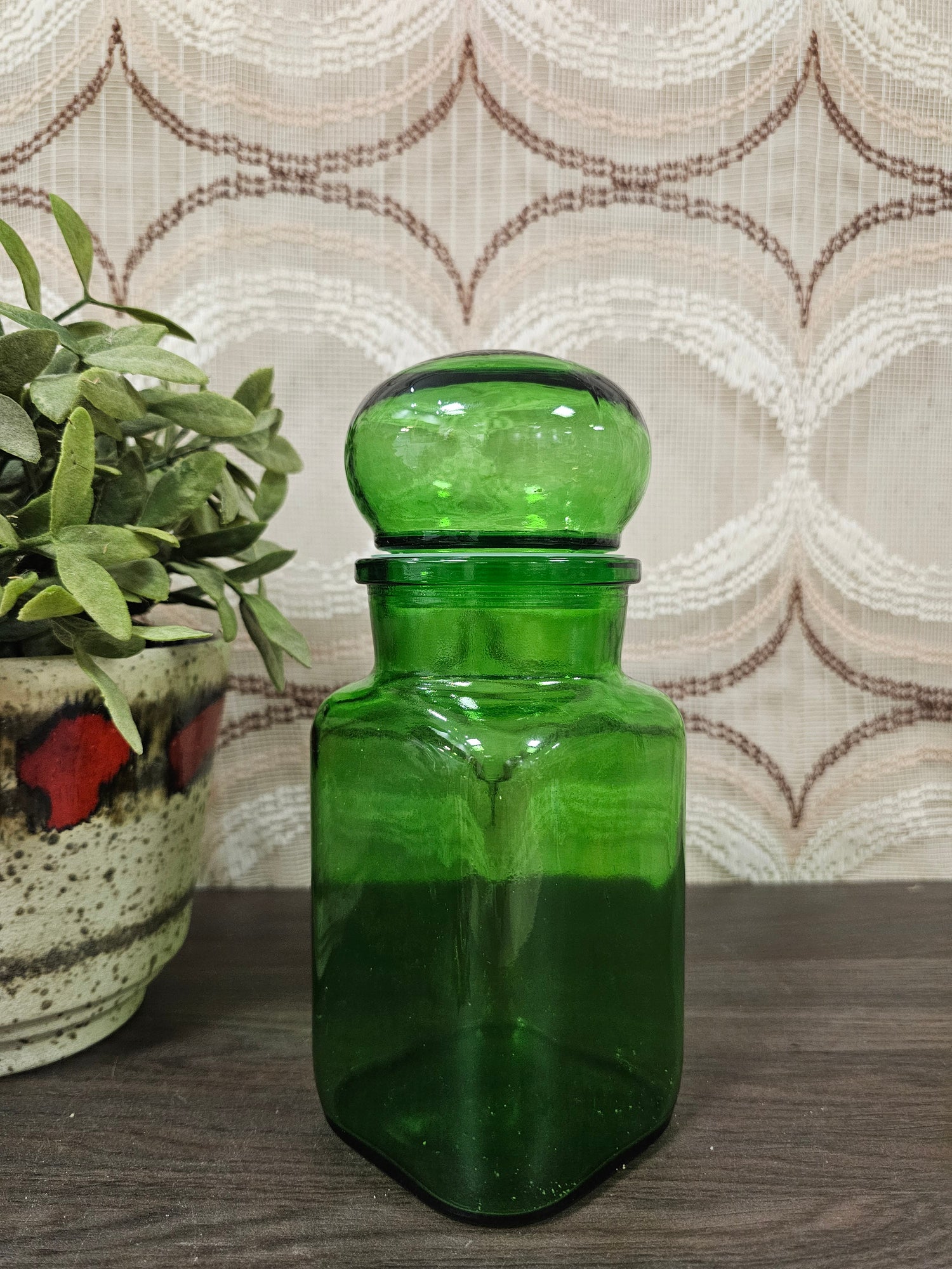 Vintage groene apothekerspot van glas circa 1 liter