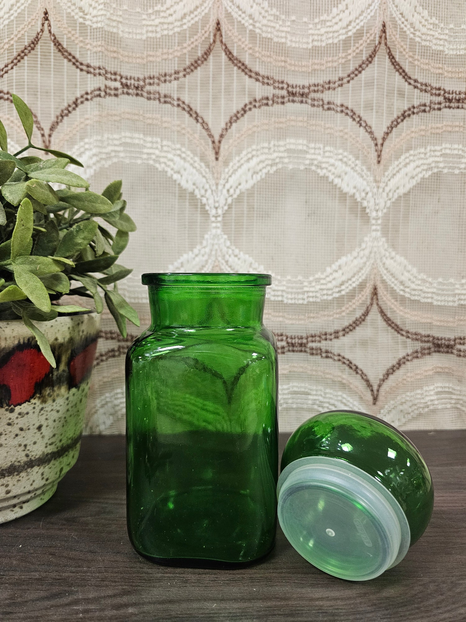 Vintage groene apothekerspot van glas circa 1 liter