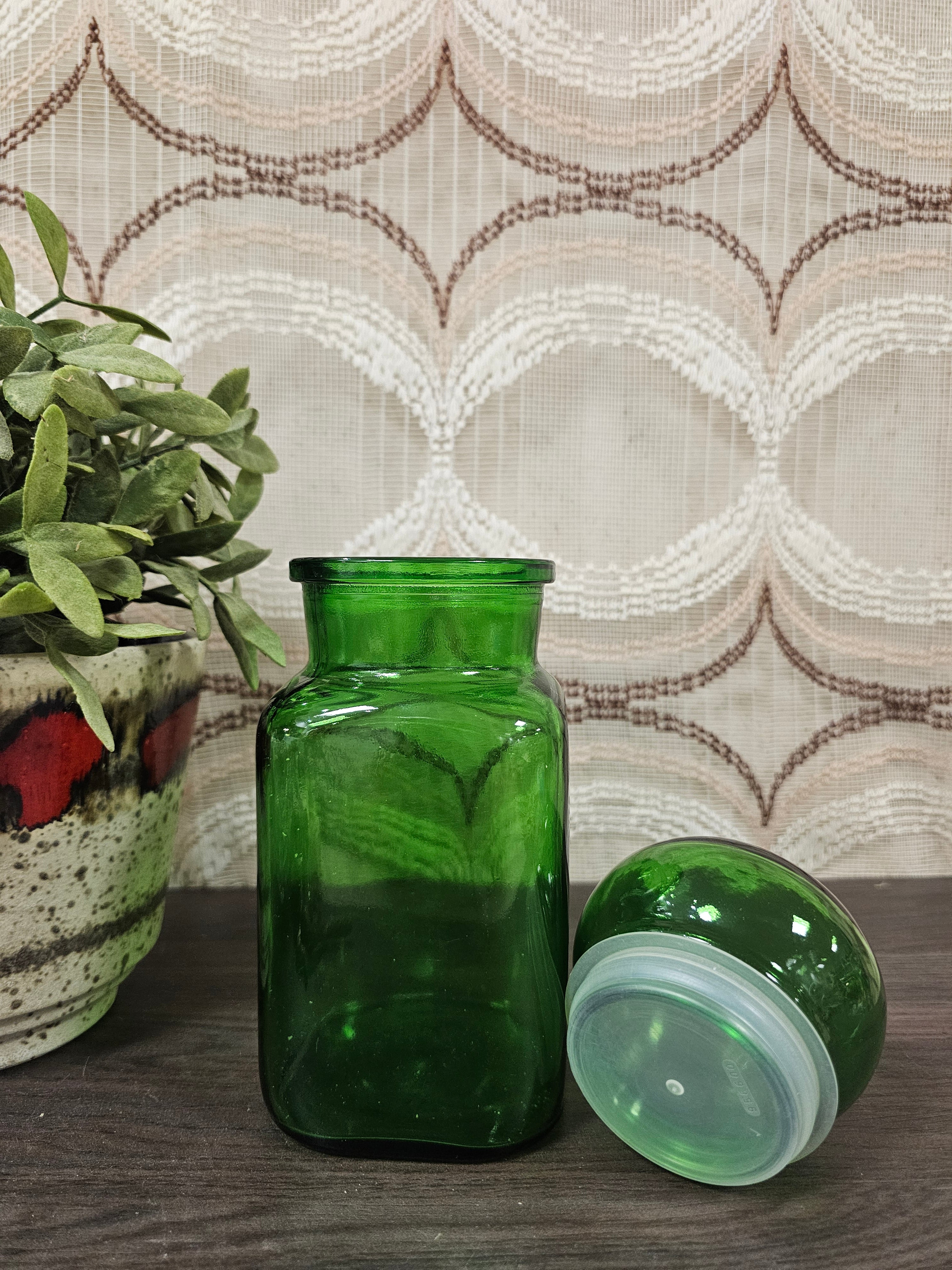 Vintage groene apothekerspot van glas circa 1 liter