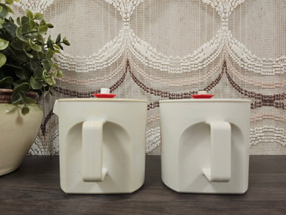 Tupperware melk- en suikerstel crèmekleur met rood motief