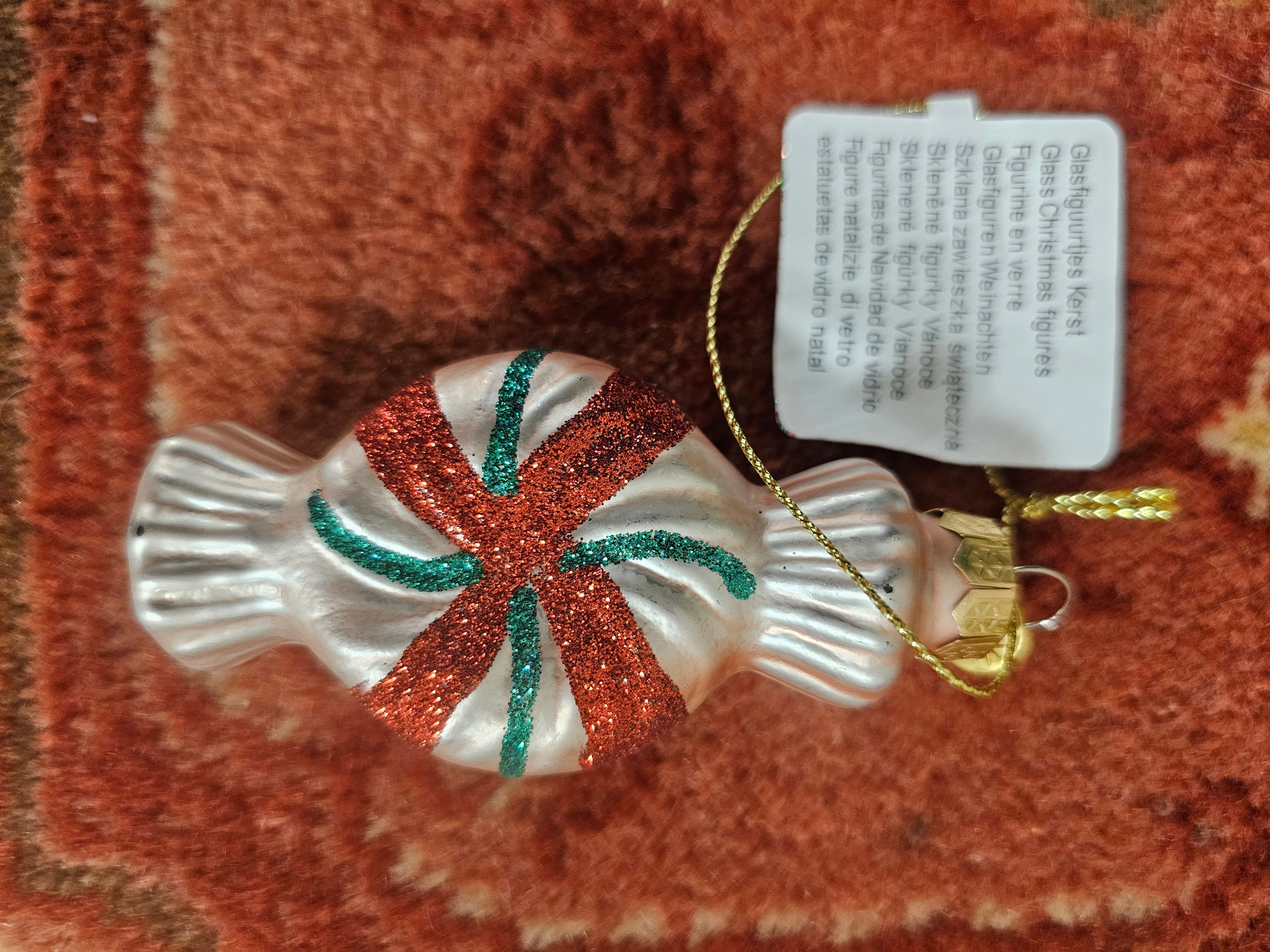 Retro glazen kerstbal snoepje parelmoerroze met glitter