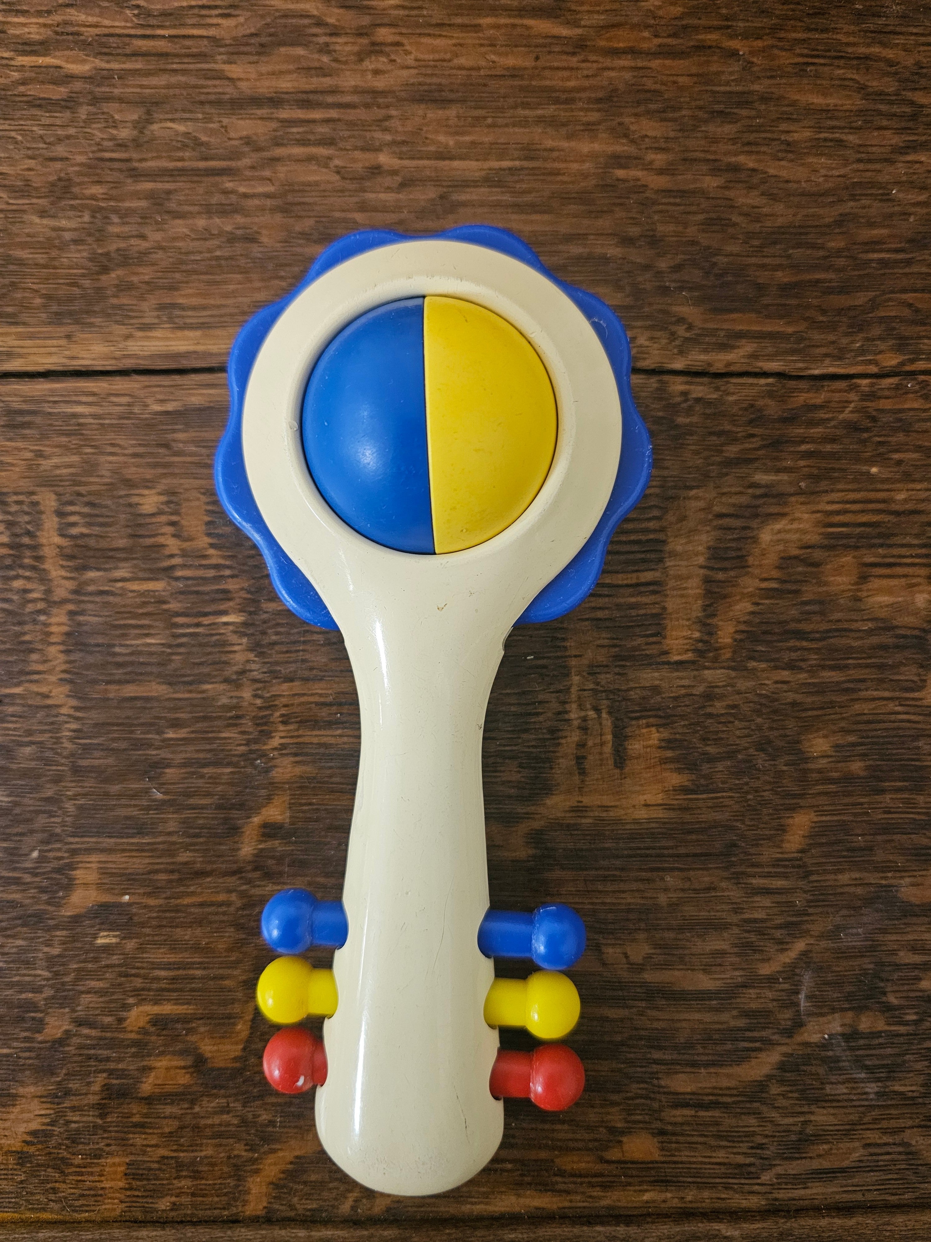 Ambi Toys rammelaar Handy Dandy – blauwe rand – jaren 80