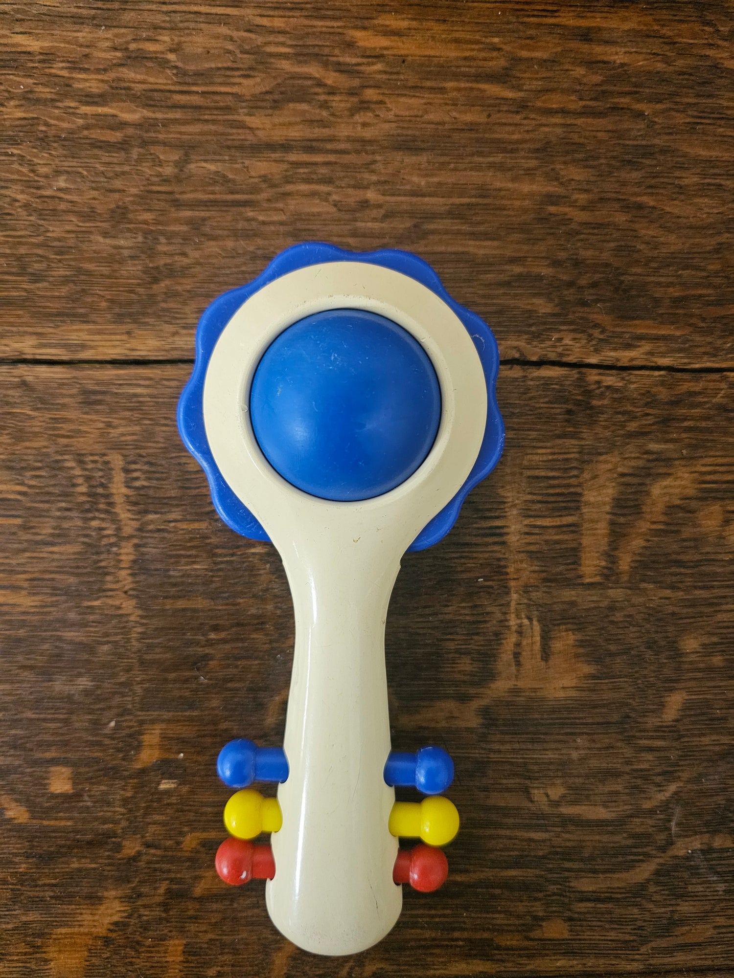Ambi Toys rammelaar Handy Dandy – blauwe rand – jaren 80