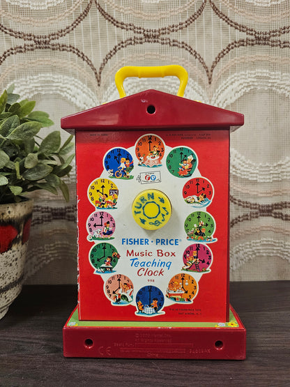 Fisher Price music box teaching clock
