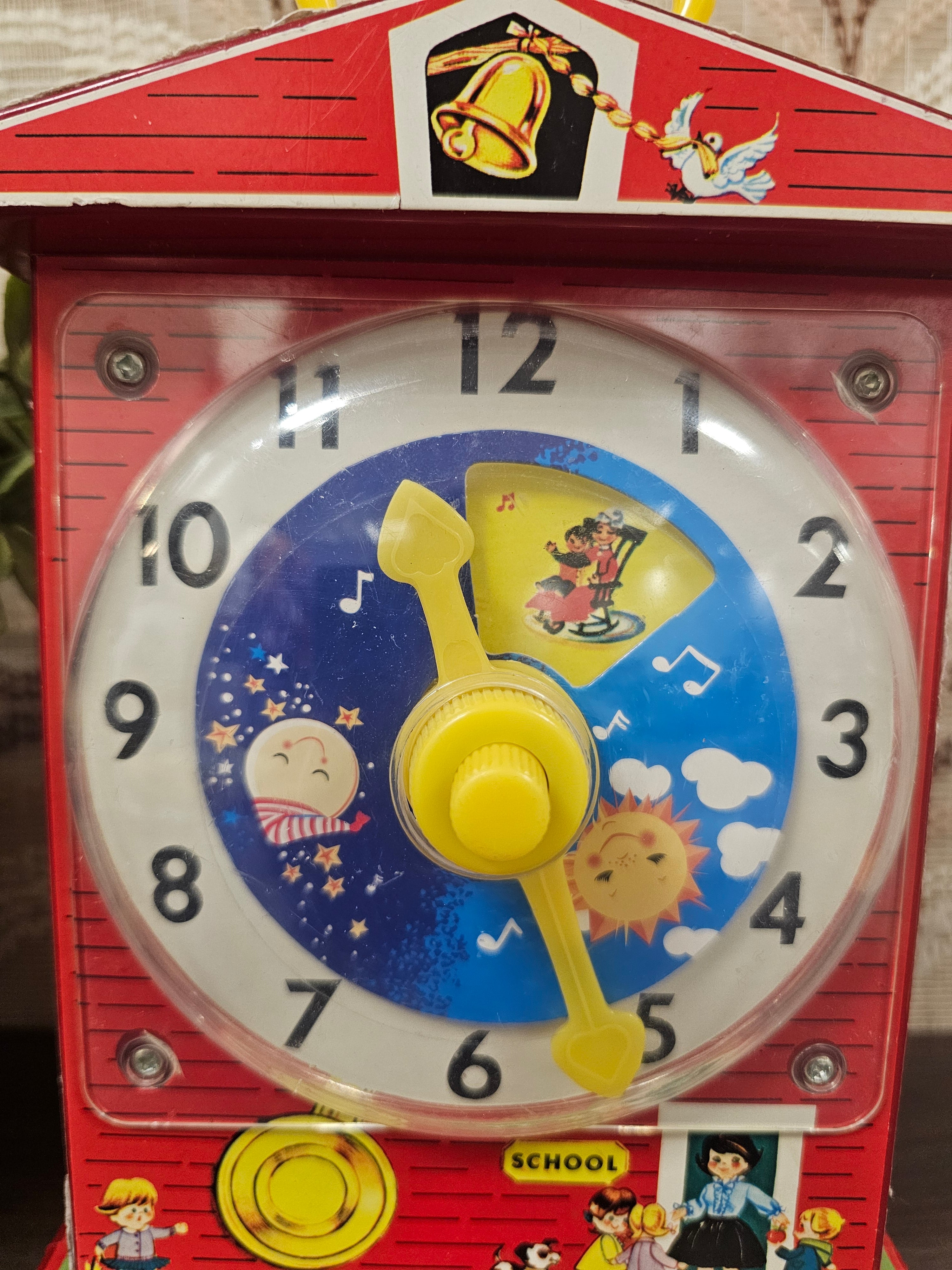Fisher Price music box teaching clock