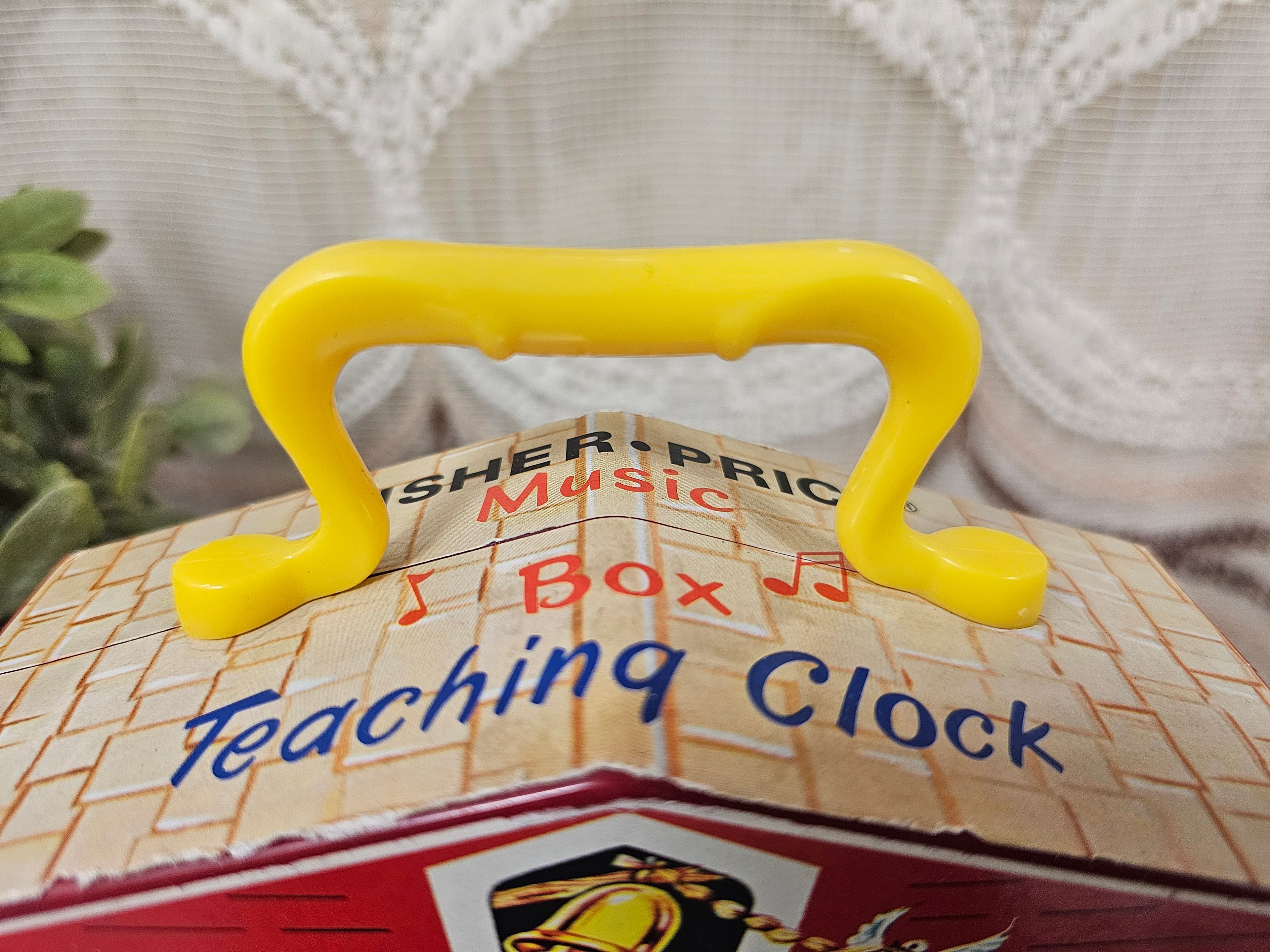 Fisher Price music box teaching clock