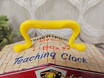 Fisher Price music box teaching clock