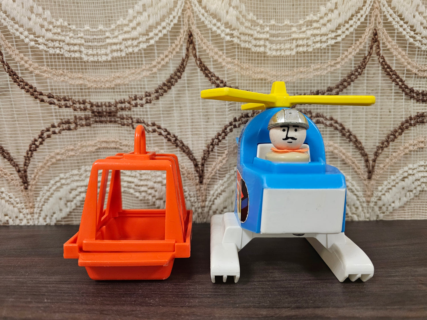 Fisher price helikopter met oranje reddingskooi jaren 70