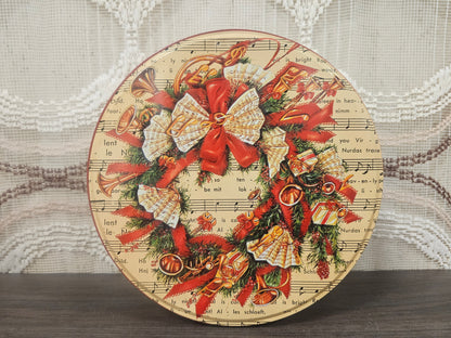 Vintage kerstblik Stille Nacht rond blik 20 cm met muziekblad en krans