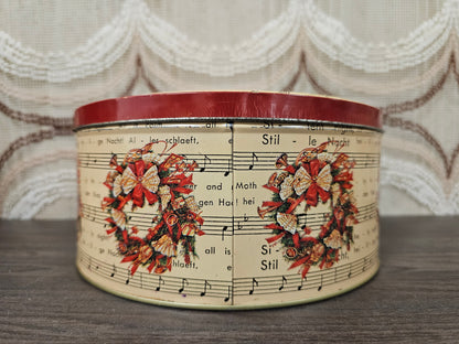 Vintage kerstblik Stille Nacht rond blik 20 cm met muziekblad en krans