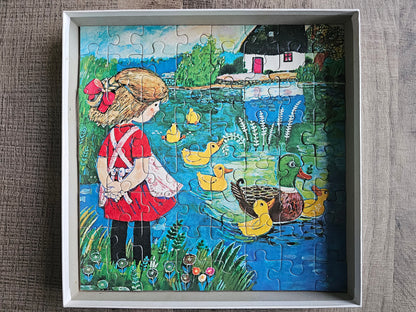 Ravensburger puzzel Alle eendjes zwemmen in het water 64 stukjes