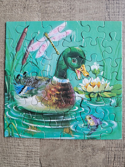 Vintage Hema puzzeldoos 3x36 stukjes