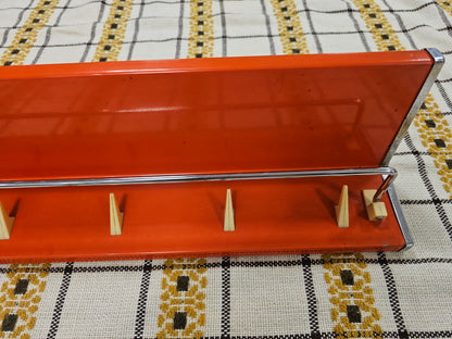 Brabantia planchet oranje metaal jaren 70 wandrek