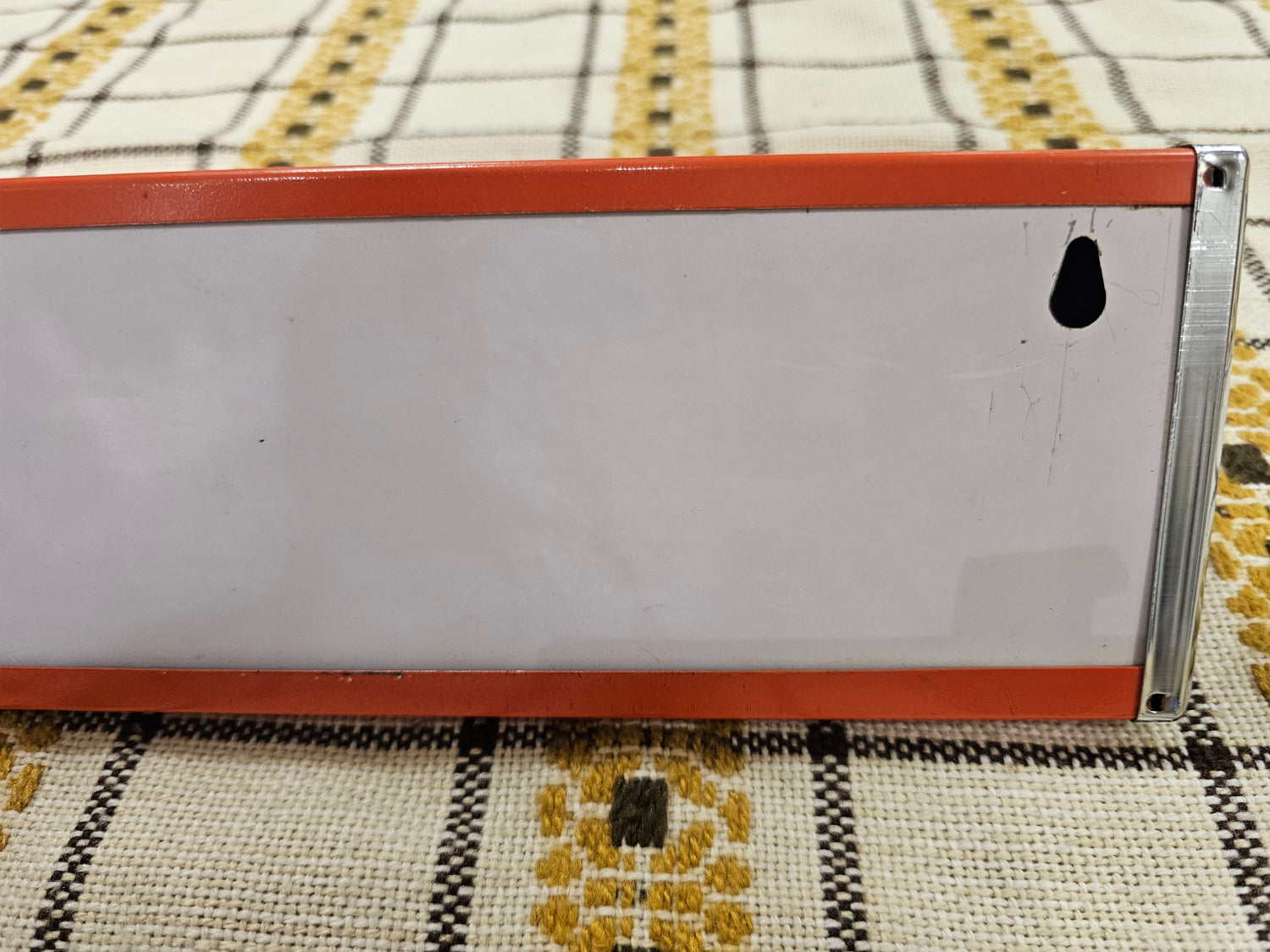 Brabantia planchet oranje metaal jaren 70 wandrek