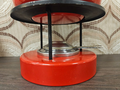 Vintage fonduepan rood met bloemen en metalen houder
