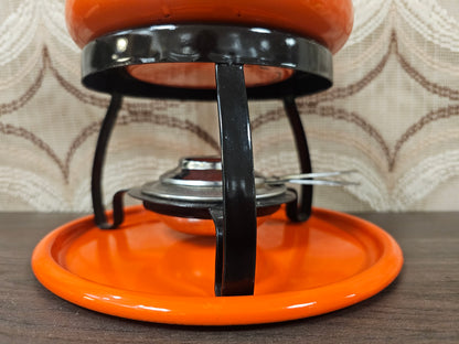 Vintage oranje fonduepan emaille met onderstel en brander