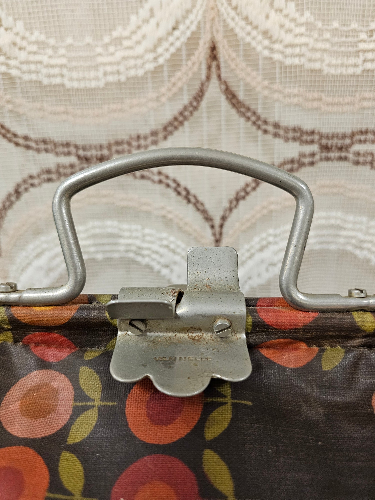 Vintage theebeurs met knip van Nelle bruin met bloemen