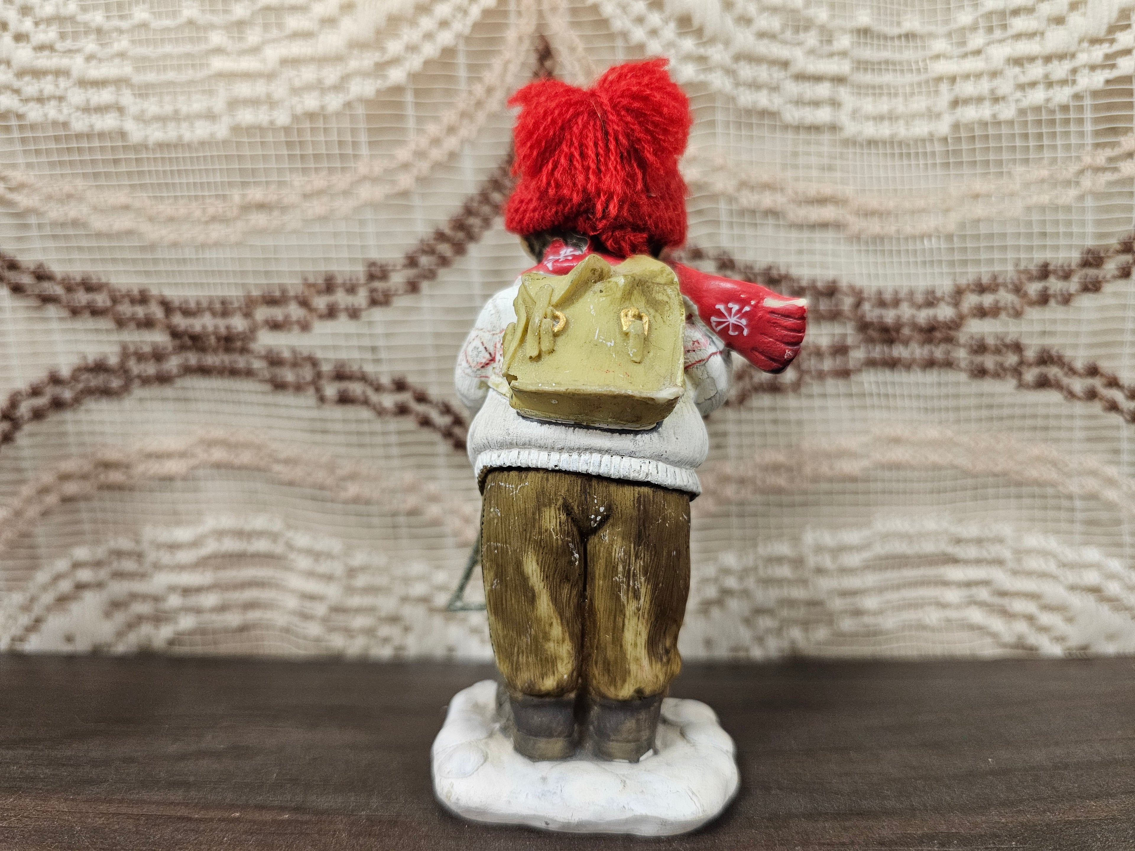 Kerstbeeldje jongen met triangel