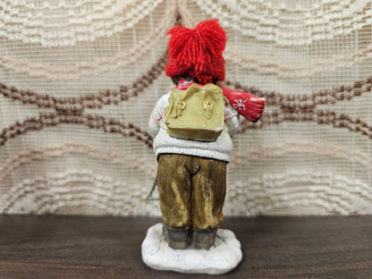 Kerstbeeldje jongen met triangel