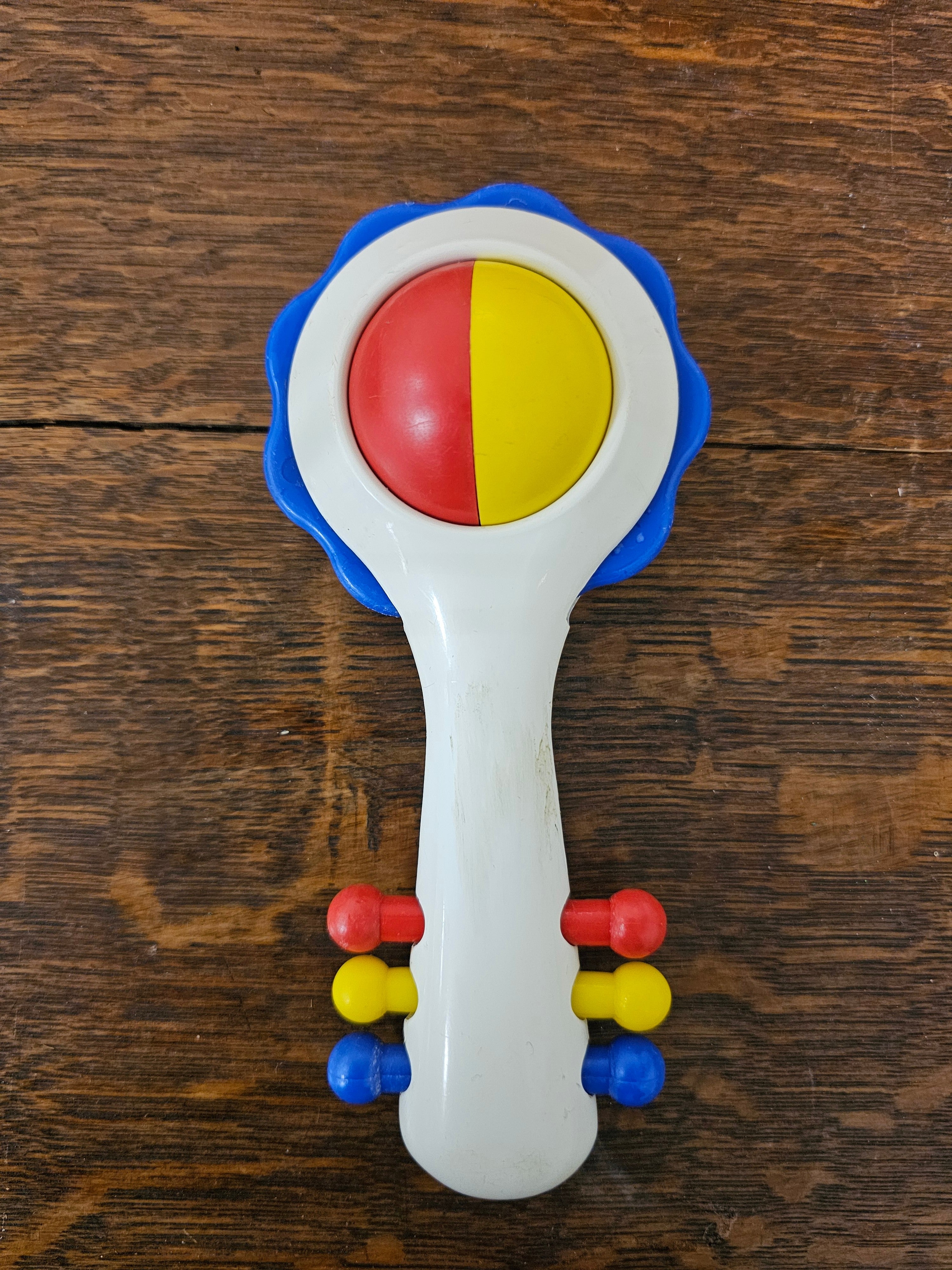 Ambi Toys rammelaar Handy Dandy – blauwe rand – jaren 80