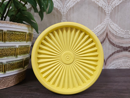 Tupperware voorraadbus geel met sterdeksel – Ø 13,5 cm x 17,5